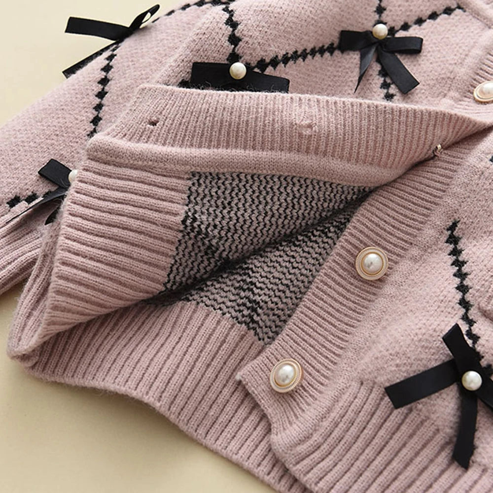 Cardigan With Black Bow Patterns And Black Pants Set