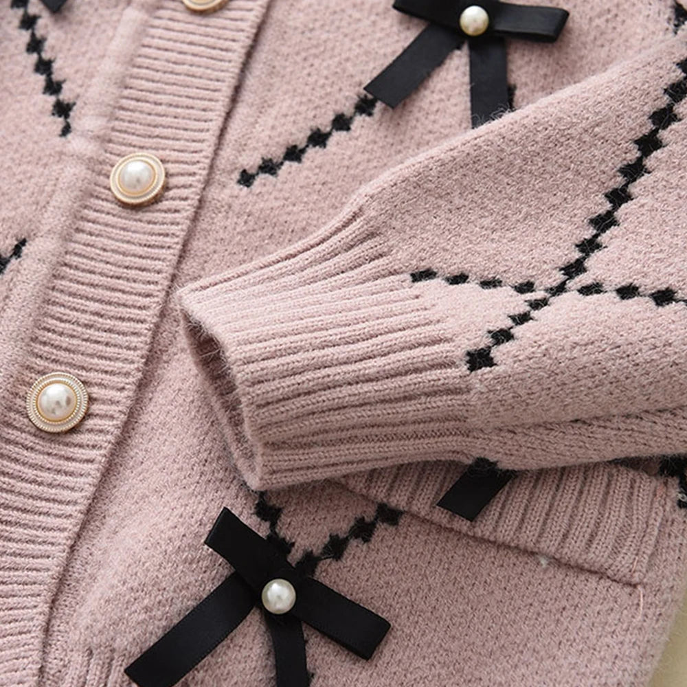 Cardigan With Black Bow Patterns And Black Pants Set
