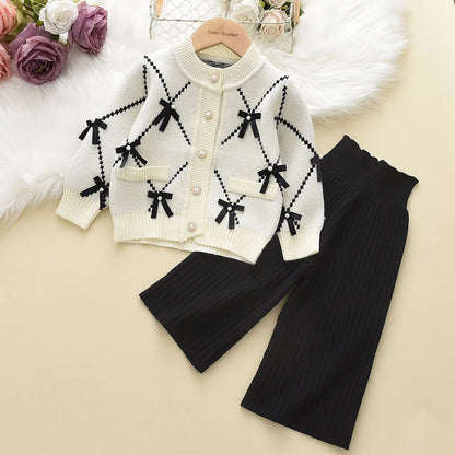 Cardigan With Black Bow Patterns And Black Pants Set