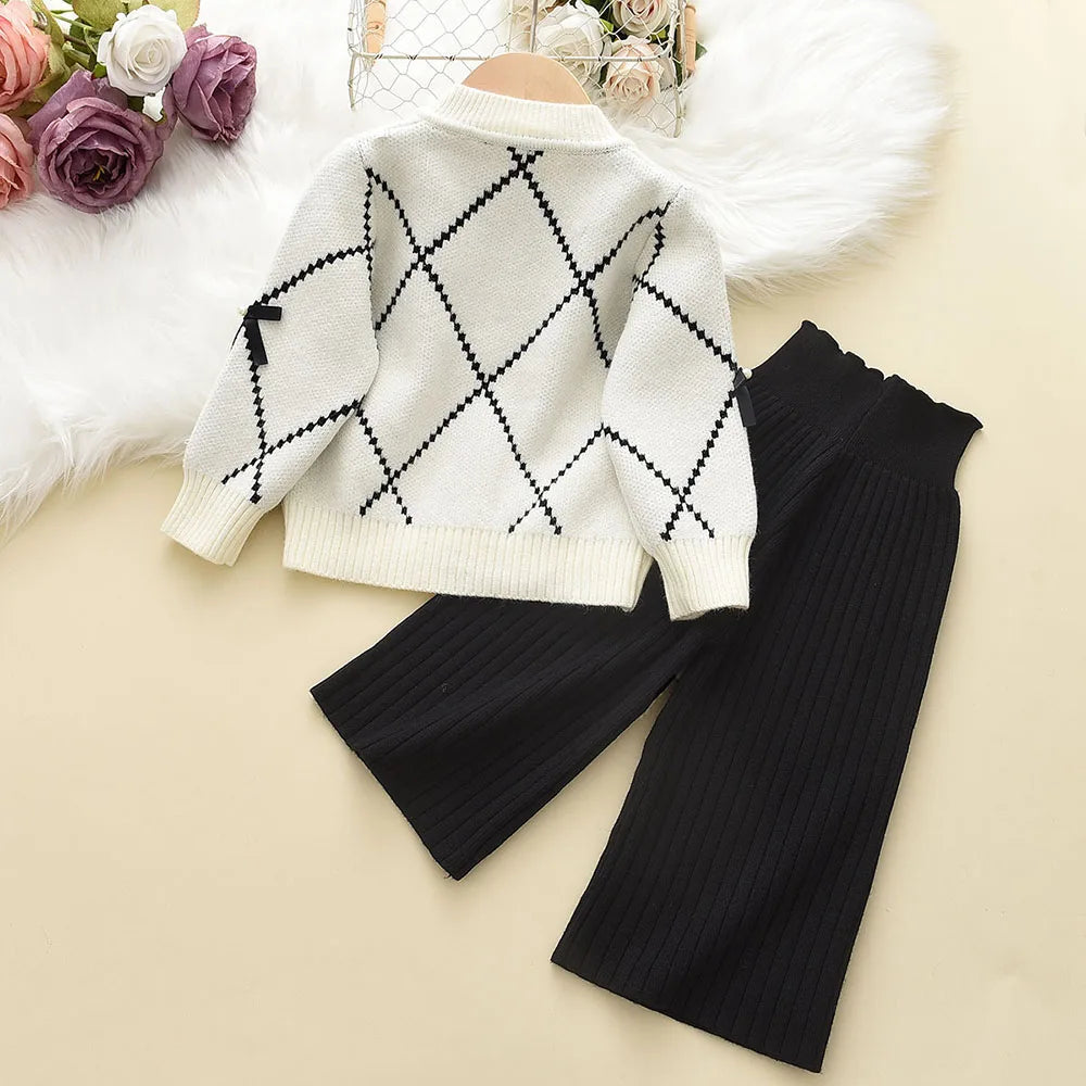 Cardigan With Black Bow Patterns And Black Pants Set