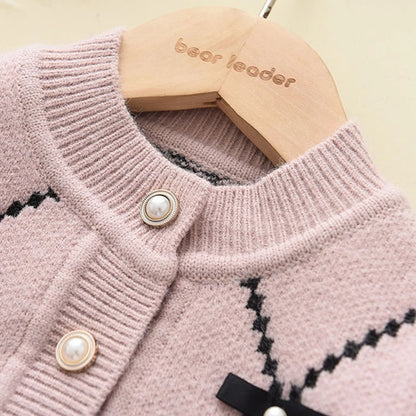 Cardigan With Black Bow Patterns And Black Pants Set